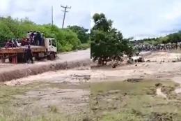 A composite image of a truck swept away by floods.